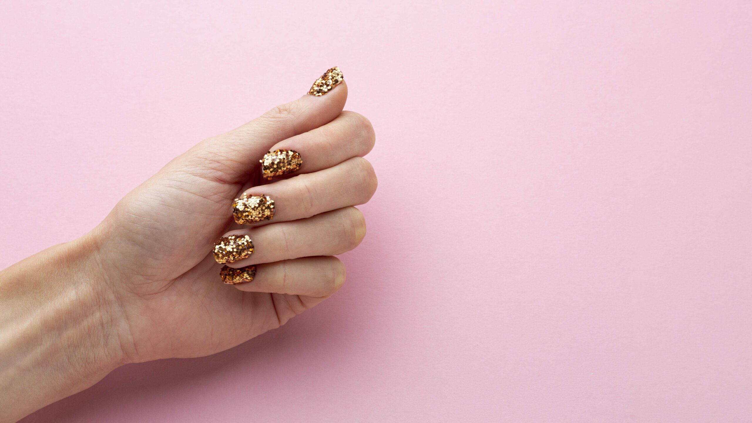 festive-lovely-glitter-nails-with-copy-space_compressed