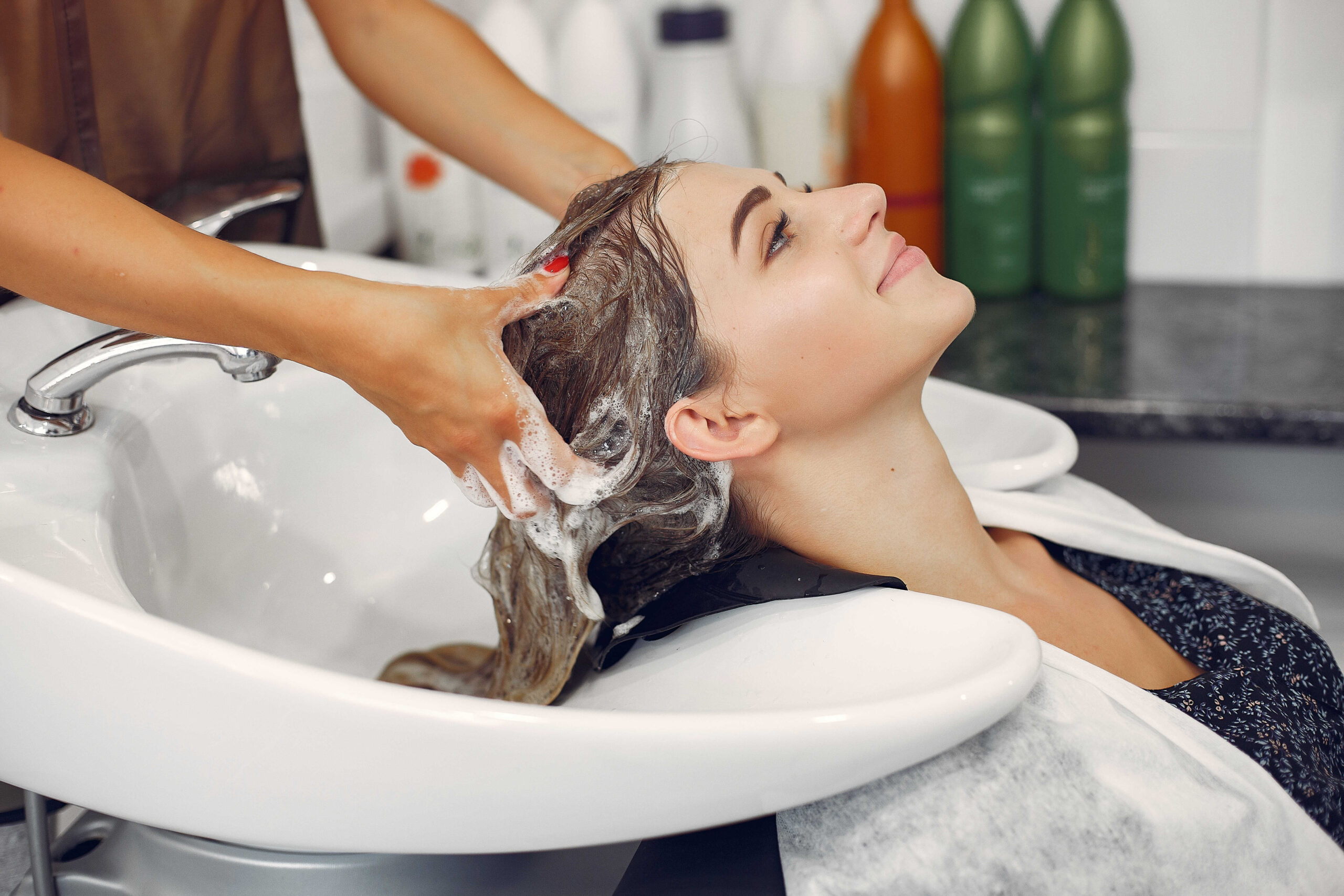 woman-washing-head-hairsalon_compressed